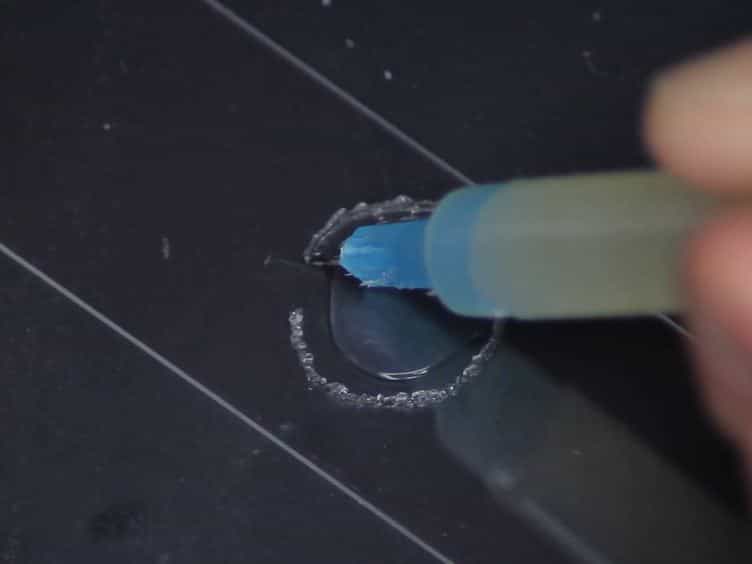 Automated Quantification of Synaptic Fluorescence in C. elegans