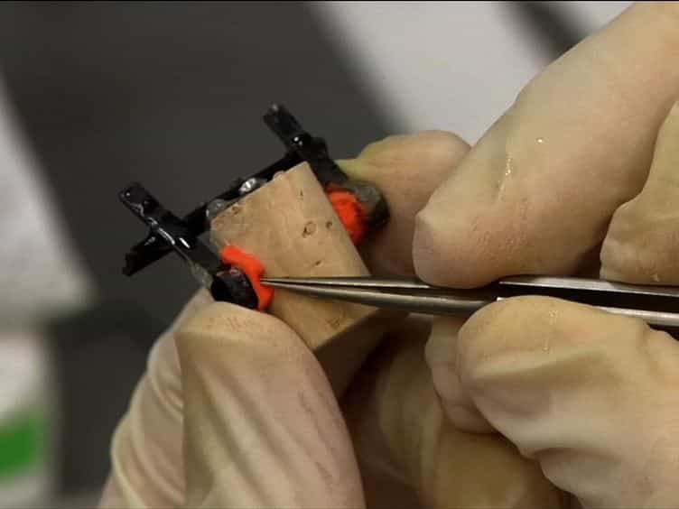 A Lightweight, Headphones-based System for Manipulating Auditory Feedback in Songbirds