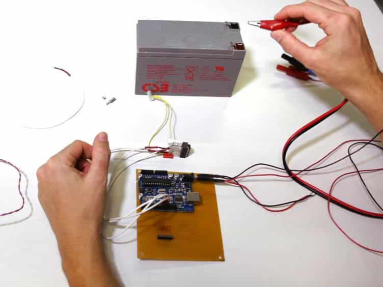 A Simple Stimulatory Device for Evoking Point-like Tactile Stimuli: A Searchlight for LFP to Spike Transitions