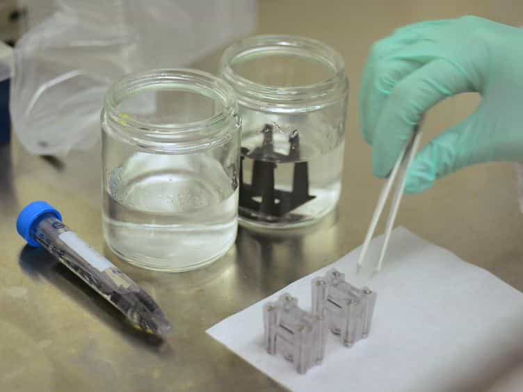 Cell Squeezing as a Robust, Microfluidic Intracellular Delivery Platform