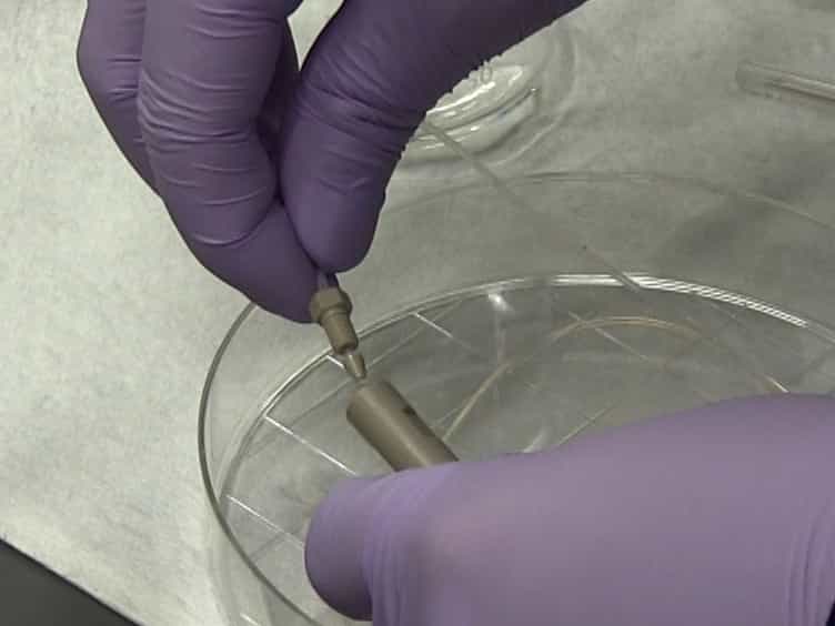In Situ Characterization of Hydrated Proteins in Water by SALVI and ToF-SIMS