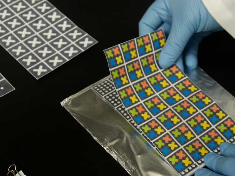 Using Adhesive Patterning to Construct 3D Paper Microfluidic Devices