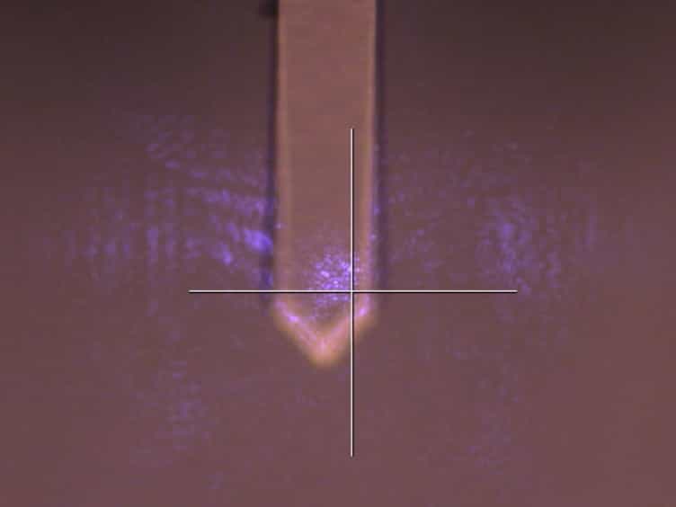 Quantitative Hardness Measurement by Instrumented AFM-indentation