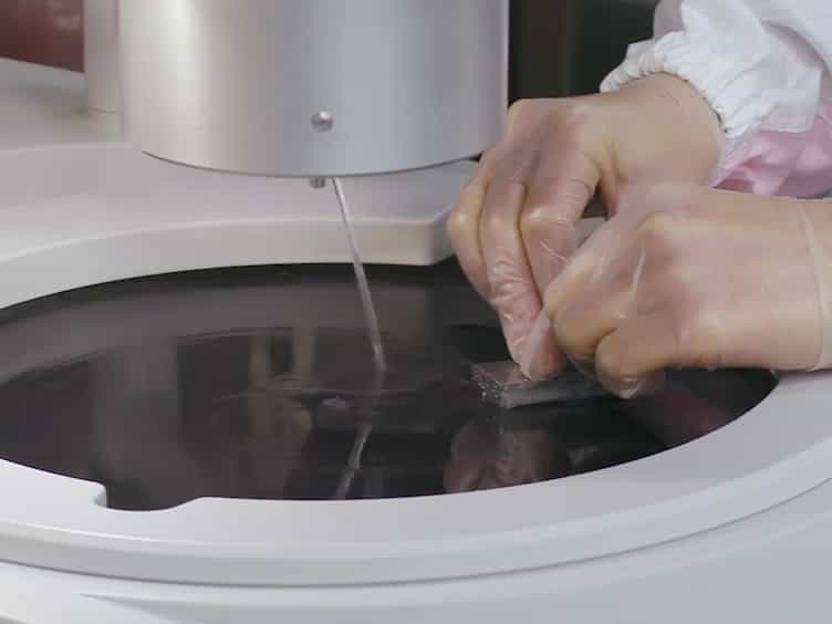 Micro/Nano-scale Strain Distribution Measurement from Sampling Moiré Fringes
