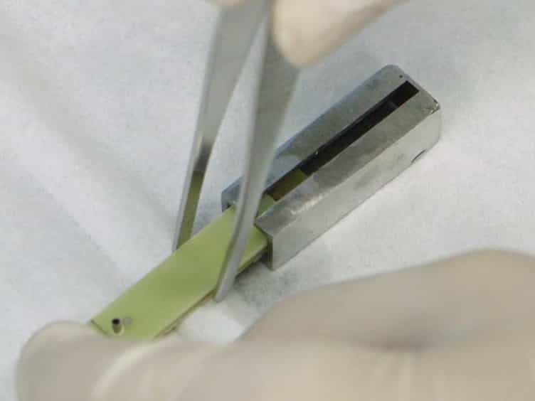 A Performance-testing Platform for a Conduction Micropump with an FR-4 Copper-clad Electrode Plate