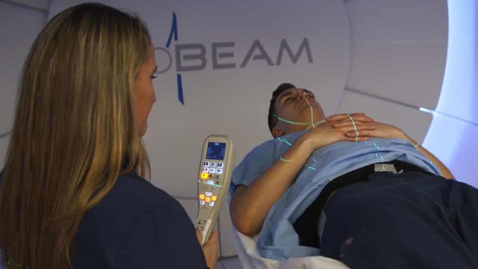 Proton Therapy Delivery and Its Clinical Application in Select Solid Tumor Malignancies