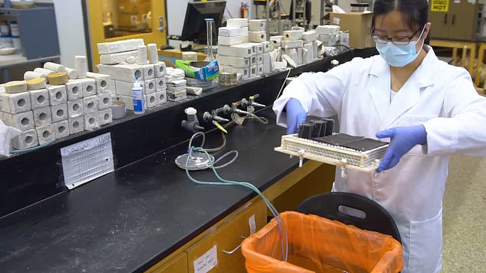 Sandy Soil Improvement through Microbially Induced Calcite Precipitation MICP by Immersion