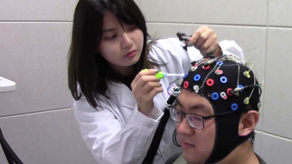 Conducting Concurrent Electroencephalography and Functional Near-Infrared Spectroscopy Recordings with a Flanker Task