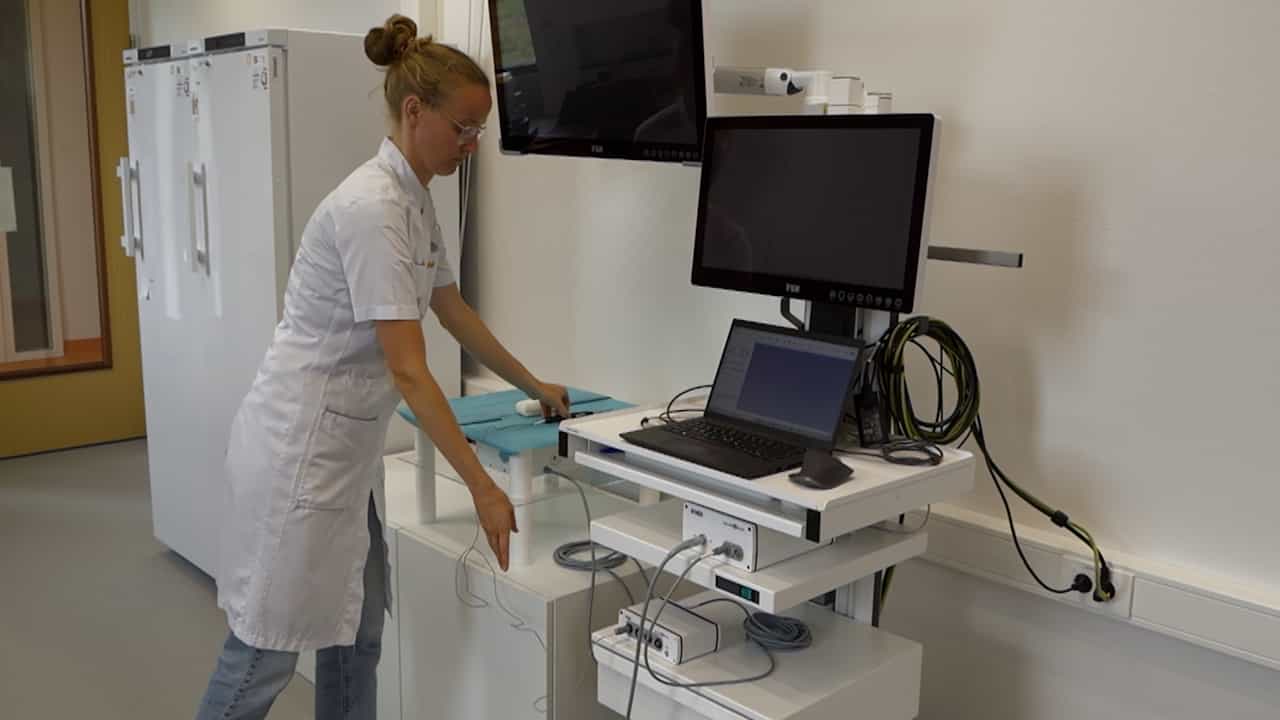 Technical Approach for Infrared Tracking for Soft Tissue Navigation with a Holographic Head-Mounted Display and Preclinical Validation