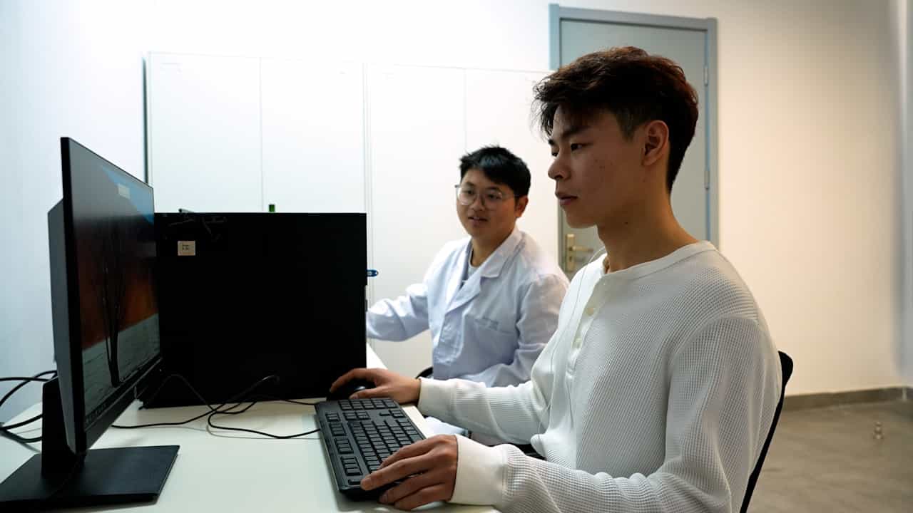 Estimate the Cognitive Load Using Electrocardiographic Measure: A Human-AI Collaborative Task