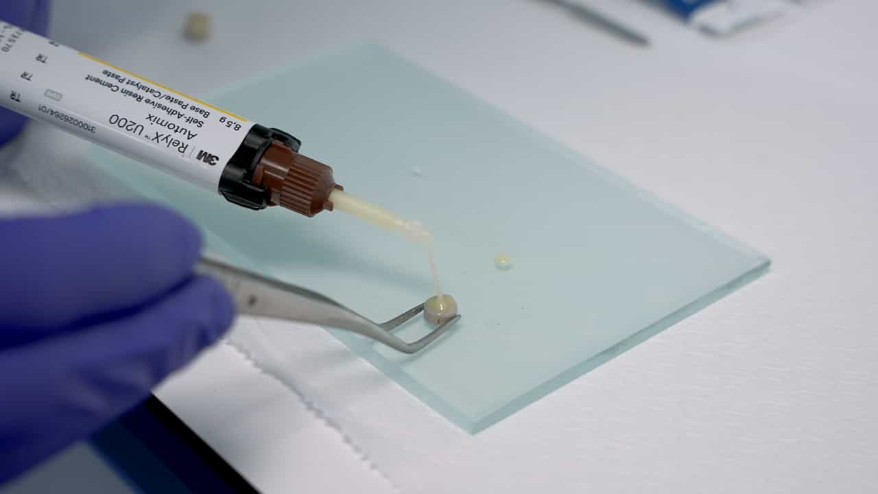 Standardized Protocol to Evaluate the Effect of Surface Treatments, Luting Cements, and Thermocycling on PEEK–Composite Bond Strength