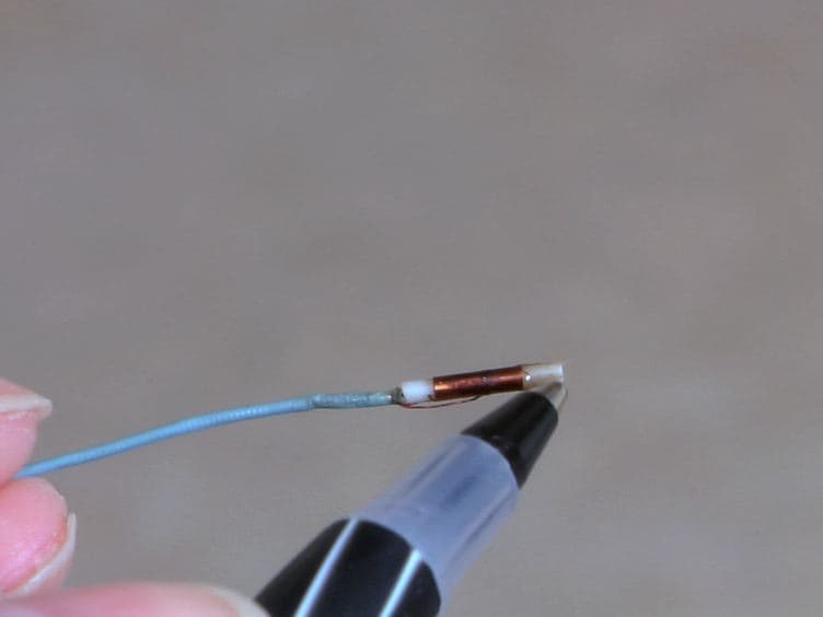 Magnetically-Assisted Remote Controlled Microcatheter Tip Deflection under Magnetic Resonance Imaging