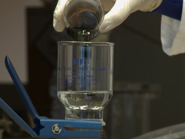 Transport of Surface-modified Carbon Nanotubes through a Soil Column