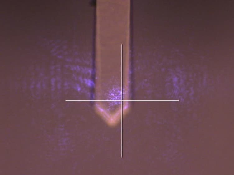 Quantitative Hardness Measurement by Instrumented AFM-indentation