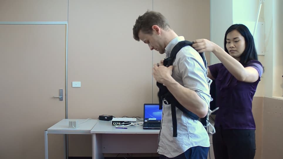 An Instrumented Pull Test to Characterize Postural Responses