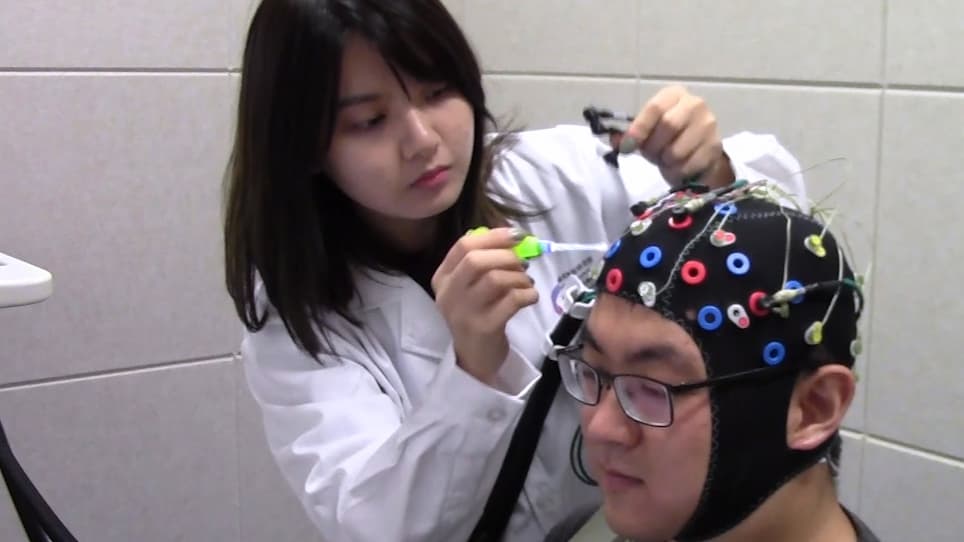 Conducting Concurrent Electroencephalography and Functional Near-Infrared Spectroscopy Recordings with a Flanker Task