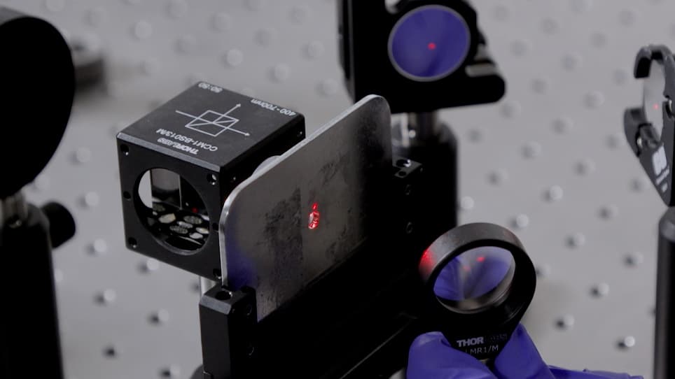 Demonstration of Spin-Multiplexed and Direction-Multiplexed All-Dielectric Visible Metaholograms