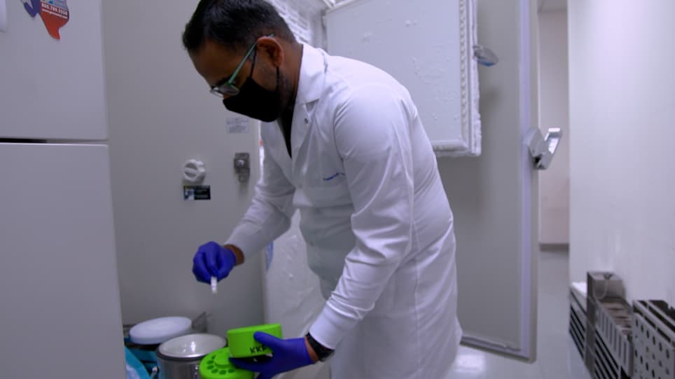 Cryogenic Sample Loading into a Magic Angle Spinning Nuclear Magnetic Resonance Spectrometer that Preserves Cellular Viability