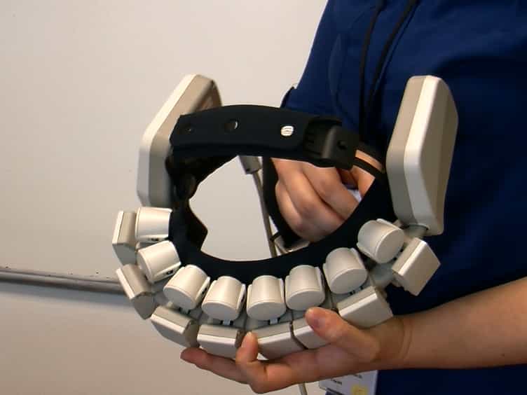 Using Fiberless, Wearable fNIRS to Monitor Brain Activity in Real-world Cognitive Tasks