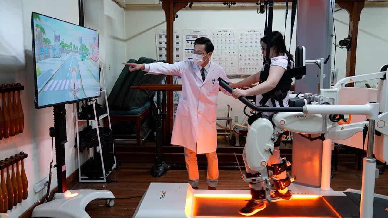 A Rehabilitation Program of Exoskeleton-assisted Body Weight-Supported Treadmill Training with Non-immersive Virtual Reality for Stroke Patients